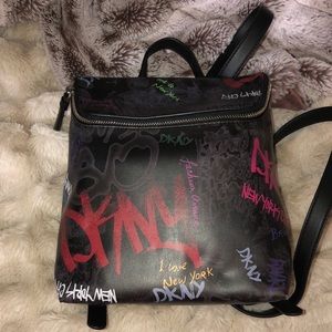 BNWT Brand New Splashed with NYC-approved graffiti art, DKNY's Tilly backpack.